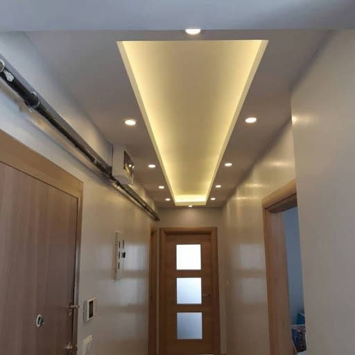Hallway with cove-lit bulkhead ceiling, Calgary